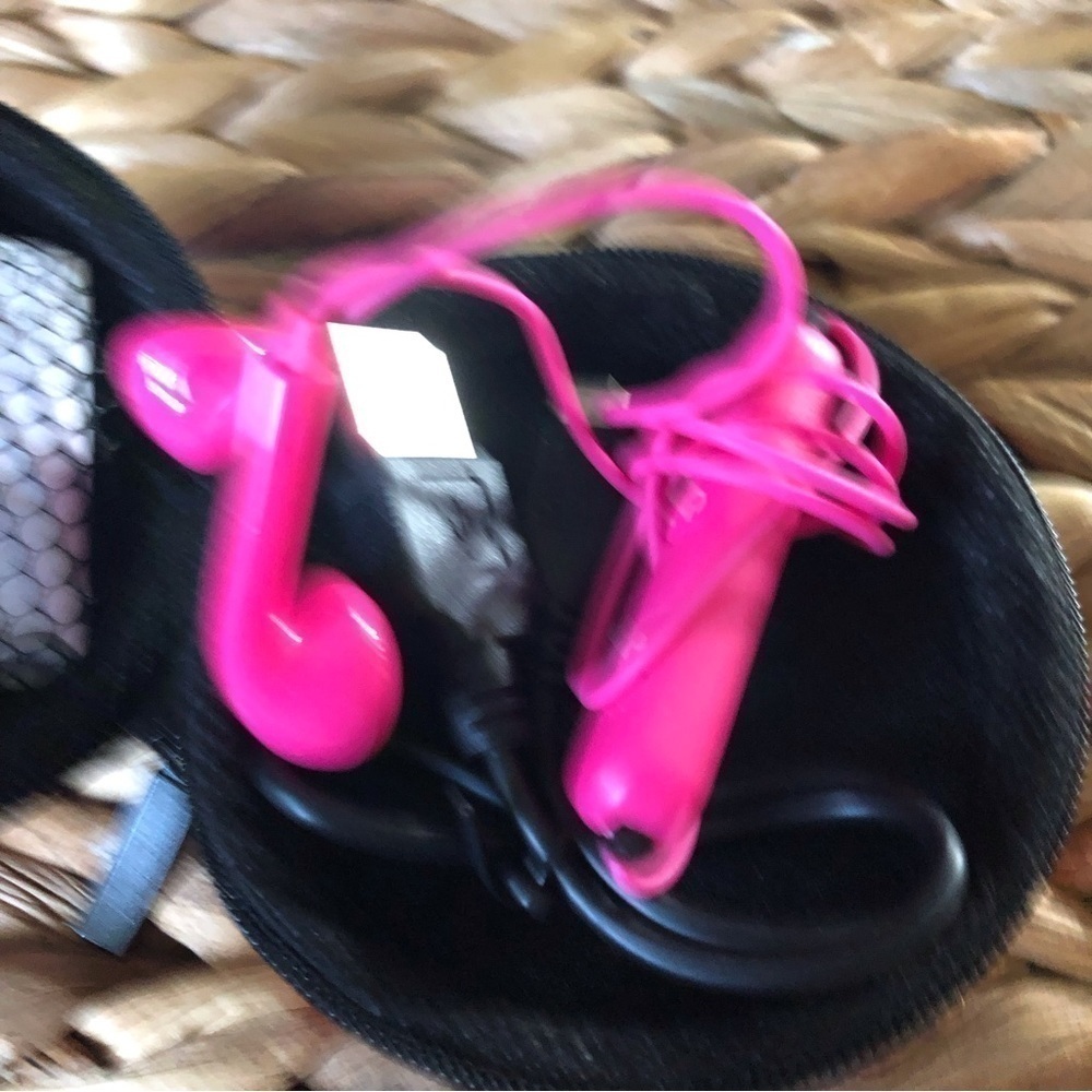 Hot pink wireless earbud with case - Picture 2 of 3